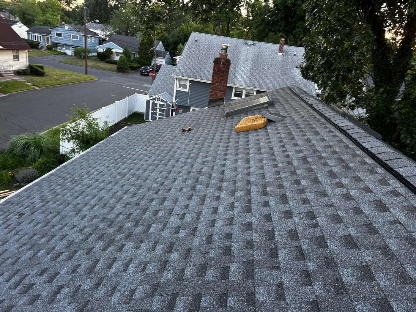 Finished shingle roof after clean-up